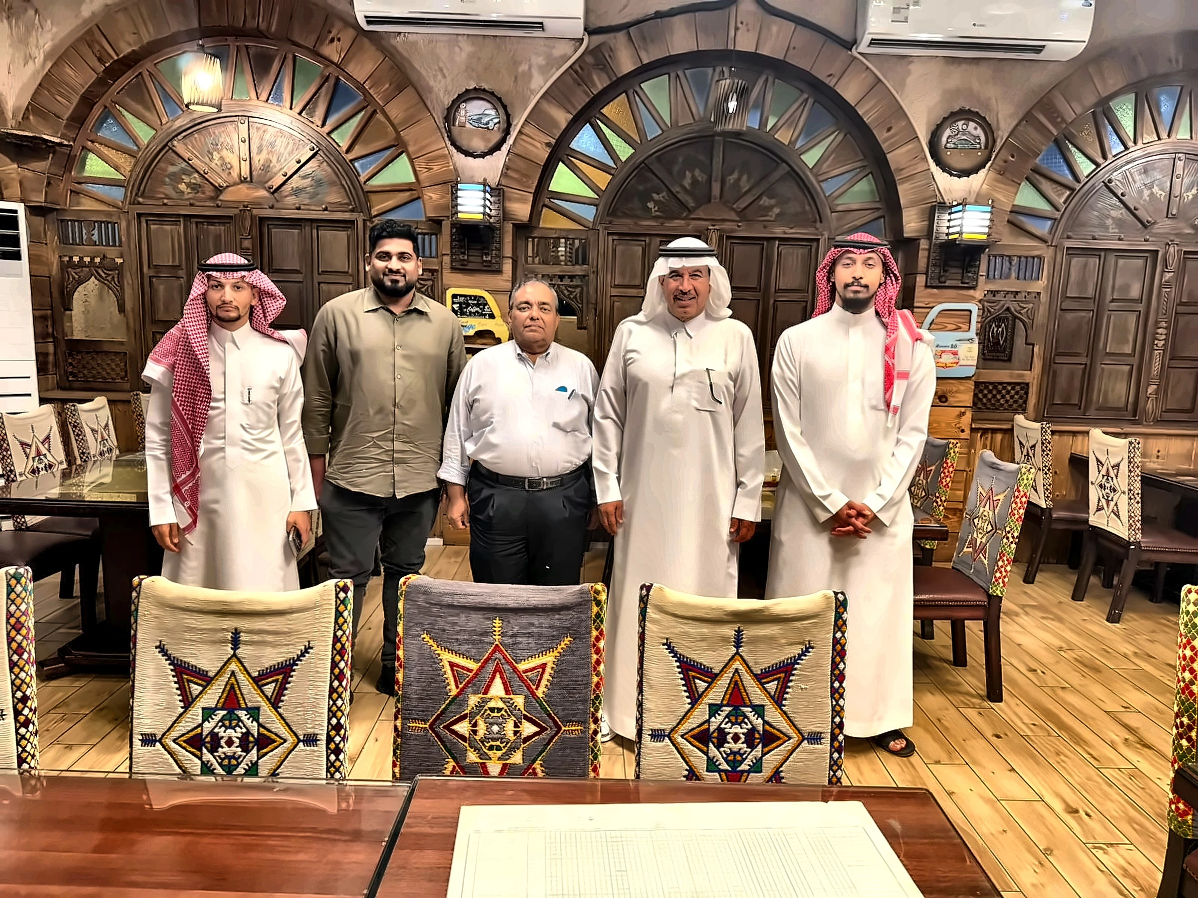 Dining with Saudi business partners at a traditional restaurant
