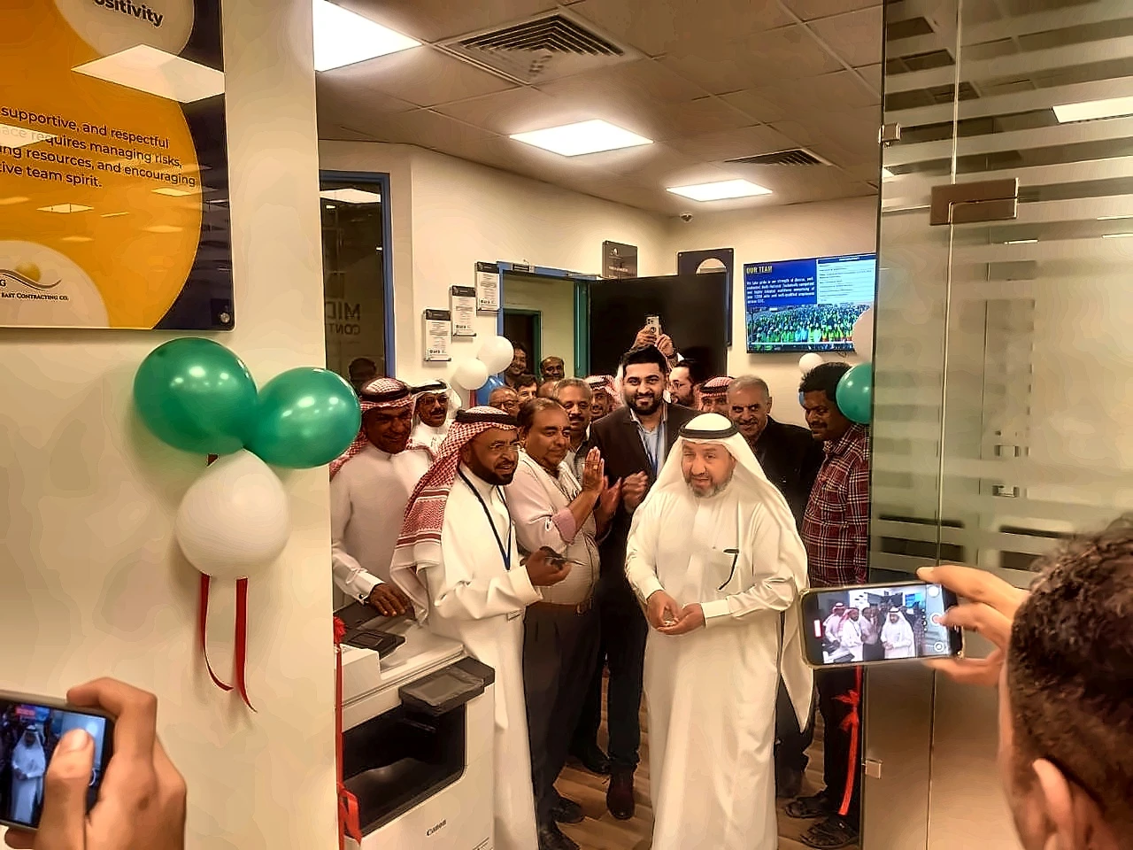 Wide shot of ribbon-cutting ceremony at MEG Al Khobar office